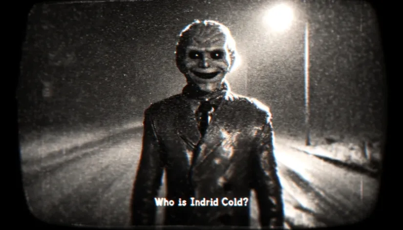 Grainy image of Indrid Cold standing on a deserted road at night with "Who Is Indrid Cold?" text.